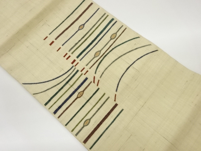 手織り生紬金彩線模様名古屋帯